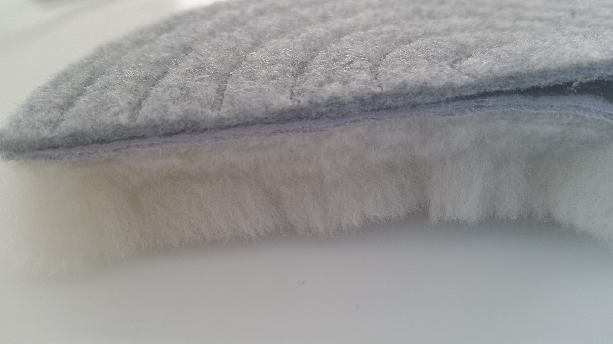 Cross-section of a natural lambskin polishing pad