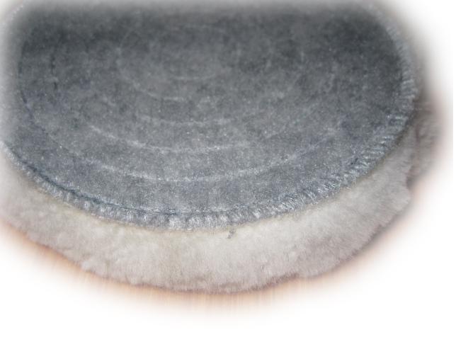 Spiral-stitched grey felt backing detail